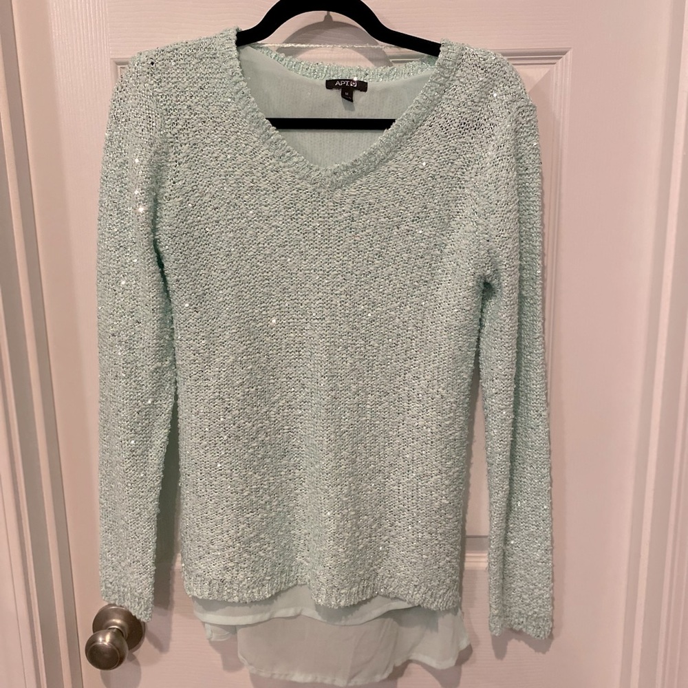 Light green sweater with sequins